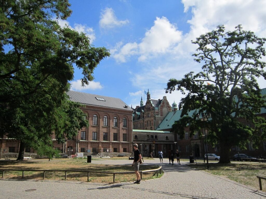 Explore the historic architecture and vibrant streets of Lund, Sweden on a sunny summer day.